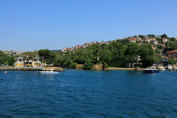 Turquoise blue sea water. View of the Bosphorus in Istanbul city on sunny summer day, in a public place.