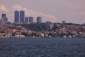 Turquoise blue sea water. View of the Bosphorus in Istanbul city on sunny summer day, in a public place.