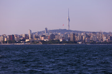 Fototapeta premium Turquoise blue sea water. View of the Bosphorus in Istanbul city on sunny summer day, in a public place.