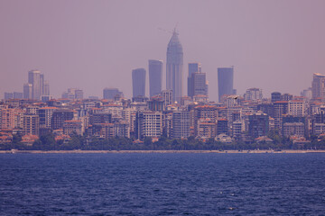 Obraz premium Evening sea view off the coast of Istanbul. Orange sunset sky 
