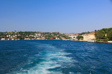 Turquoise blue sea water. View of the Bosphorus in Istanbul city on sunny summer day, in a public place.