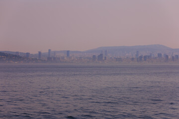 Fototapeta premium Evening sea view off the coast of Istanbul. Orange sunset sky 