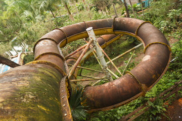 Forgotten waterslide, hidden in the depths of a lush jungle. Beauty of nature with vibrant greens...