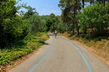 Beautiful road and landscape, streets and roads of a southern small town, public place in Turkey, on a summer sunny day