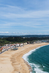 View from the hill to the sandy beach 'Praia da Nazar&eacute;' , Praia do Norte beach and Nazare town, Portugal