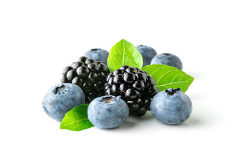 Sweet berries mix with green leaves isolated on white background. Ripe blueberry and blackberry.