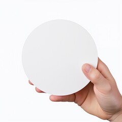 hand holding blank white round card isolated on white background
