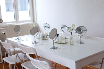 Mirrors and cosmetics for cosmetologist's master class