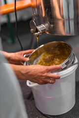 Machinery and equipment for beekeeping. Drip fresh honey into a bucket