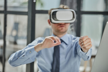 businessman in virtual reality headset in the office