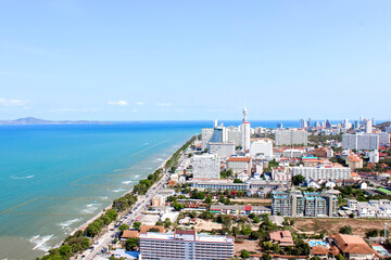 Panoramic view of urban coastal city with modern architecture and skyline overlooking the ocean