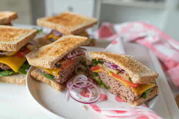 Homemade cheeseburger with whole wheat toast