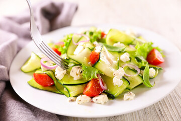 zucchini salad with tomato and feta cheese