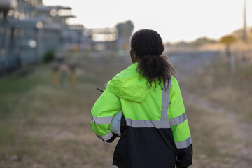 Fototapeta premium Engineer survey team checking construction project inspection work construction site .Team Civil engineer working outdoor next to the power plant.