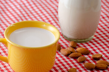 Almond milk in a glass, highlighting its creamy texture and health benefits.