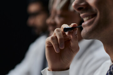 professional businesspeople working together, on research plan in boardroom.