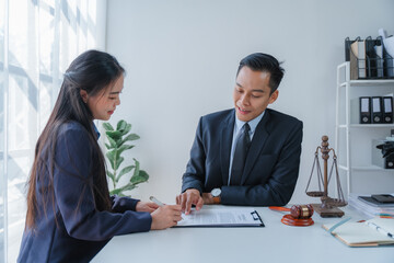 Lawyer consulting with client in office. Legal advice and services, attorney-client consultation....