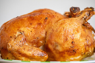 Classic roast chicken isolated and in selective focus