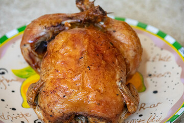 Classic roast chicken isolated and in selective focus