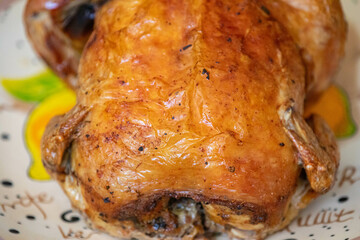 Classic roast chicken isolated and in selective focus
