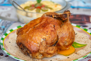 Classic roast chicken isolated and in selective focus