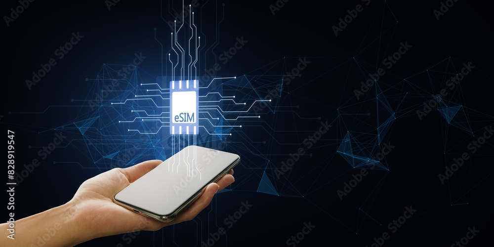 Aufkleber close up of female hand holding cellphone with esim chip card icon with circuit on dark background. 