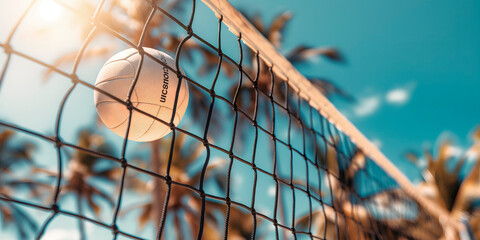 Summer seascape with beach volleyball net and ball under blue sky, perfect for travel articles, vacation package advertisements, and sports event flyers, featuring plenty of copy space for text.