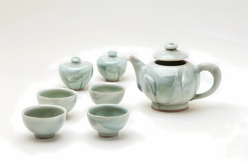 A Korean Celadon Tea Set, renowned for its jade-green glaze, represents traditional Korean aesthetics