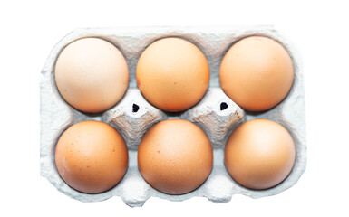 6 eggs in carton on isolated background