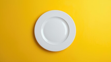 White plate with finger root on yellow background