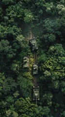 Fototapeta premium An aerial view of an Military tank M1 Abrams column moving through a dense forest The tanks leave distinct trails in the foliage