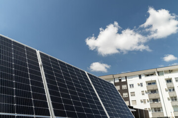 Fototapeta premium Solar panels near an apartment building.