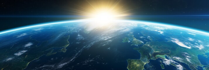 Stunning view of the Earth from space with the sun rising over its horizon