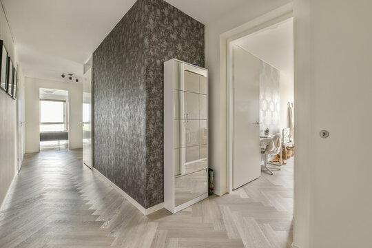 Modern home interior with stylish herringbone flooring