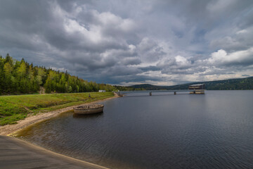 Fototapeta premium Water reservoir Josefuv Dul in Jizerske mountains in spring day