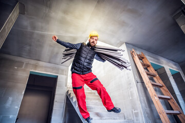 Man falling off the ladder. Accident of a man worker at the construction site. Work injury,...