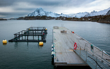 pier in the lake for salmon farming