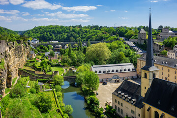 Saint John&rsquo;s Church or Saint John on the Stone (Eglise Saint-Jean, 1705) in the valley and the river Alzette. Church St Jean of Grund belonged to the Benedictine Abbey of Munster. Luxembourg City.