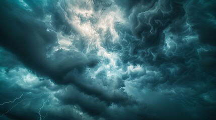 Dramatic, dark, blue cloudy sky overlay. Dramatic sky and lightning. Bad weather with dark clouds. Rain and thunderstorm in dramatic sky