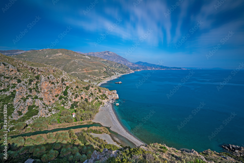 Sticker The coastline with mountains and blue, calm sea