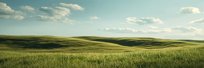 Serene landscape of rolling green hills with lush grass under a calm blue sky with clouds