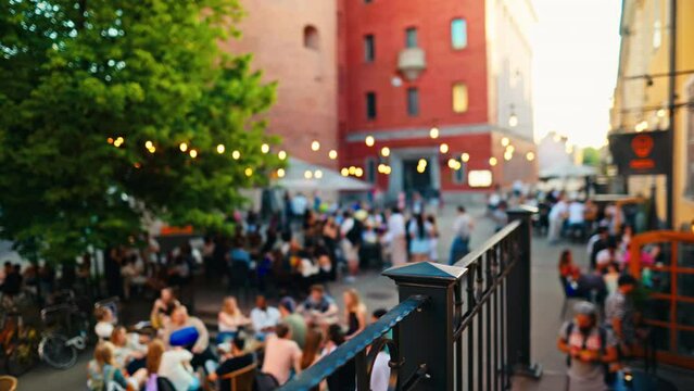 Outdoor Caf Scene with Lights in Vibrant Urban Setting