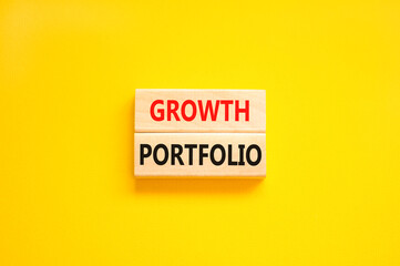 Growth portfolio symbol. Concept words Growth portfolio on beautiful wooden block. Beautiful yellow paper background. Business Growth portfolio concept. Copy space.