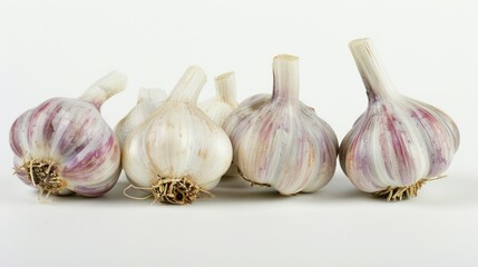 Obraz premium Garlic on White Background. Ripe Organic Garlic and Herbs Isolated on White Background
