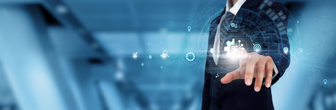 Automation: Businessman Touching the Automation Icon and Global Technological Networking. Efficiency, Innovation, Optimization