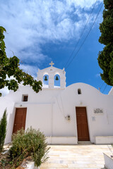 View of a little picturesque chapel surrounded  by trees in Ios Greece