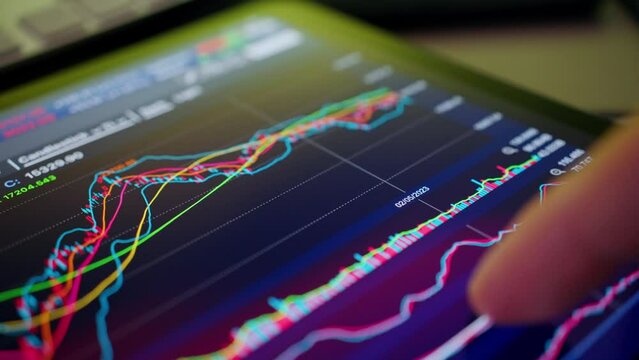 Finger on the stock market data over the digital tablet computer