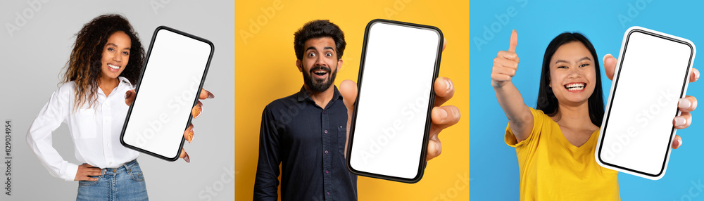 Aufkleber multiethnic millennials standing together, holding a phone with a blank screen. they appear to be lo