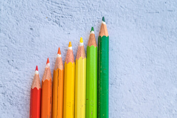 Green , Yellow , Orange and Red Pencils . Survey concept 