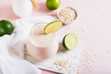 Oatzempic trendy drink for weight loss made from oatmeal, water and lime in a glass